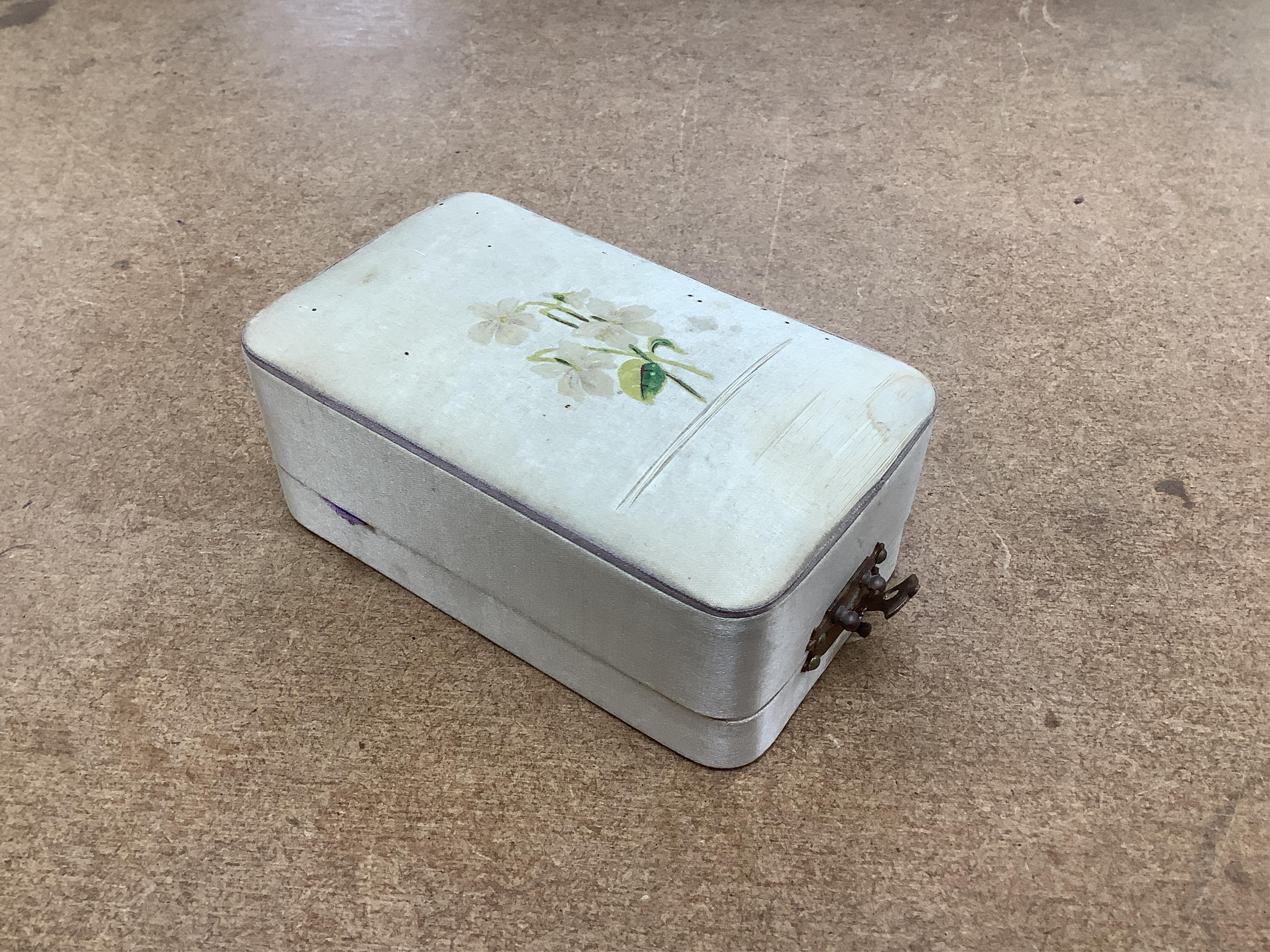 An early 20th century Vinolia cut glass scent bottle and stopper labelled White Lilac, with original case. Condition - fair